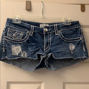 Jean shorts with rips and jewels